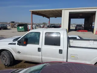 2015 Ford F-350 XL with VIN 1FT7W3AT0FEB56493, listed as a IAAI auction lot 41629744 with 261,988 mi miles and . Bid and sale history available at DreamBid. Image 14.