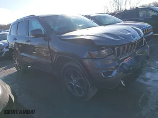 2018 Jeep Grand Cherokee Limited with VIN 1C4RJFBG0JC244457, listed as a IAAI auction lot 41485870 with 115,810 mi miles. Bid and sale history available at carsss.com. Image 1.