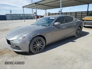2015 Maserati Ghibli S Q4 with VIN ZAM57RTA2F1138065, listed as a Copart auction lot 52710915 with 67,629 mi miles and Salvage Title. Bid and sale history available at carsss.com. Image 1.