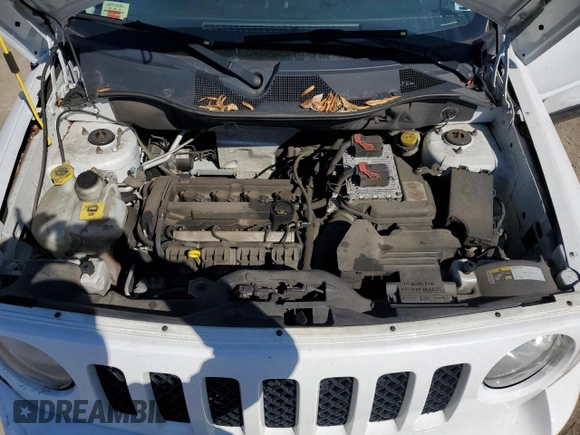 2014 Jeep Patriot Latitude with VIN 1C4NJPFA9ED758298, listed as a Copart auction lot 47253425 with 139,322 mi miles and Salvage title. Bid and sale history available at DreamBid. Image 12.