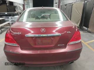 2006 Acura RL z VIN JH4KB16566C008802, wystawiony jako IAAI lot #41457360 z przebiegiem 212 443 mil mil oraz . Historia ofert i sprzedaży dostępna na DreamBid. Obrazek 16.