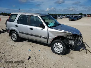2000 Honda CR-V LX with VIN JHLRD2841YC010239, listed as a Copart auction lot 69995684 with 188,885 mi miles and Salvage Title. Bid and sale history available at carsss.com. Image 4.