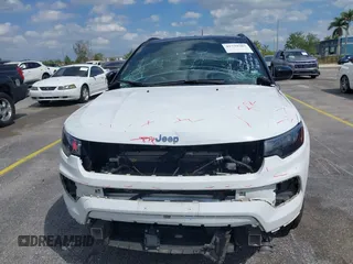 2023 Jeep Compass (RED) Edition with VIN 3C4NJDCN9PT564826, listed as a IAAI auction lot 41779307 with 52,344 mi miles and . Bid and sale history available at carsss.com. Image 6.