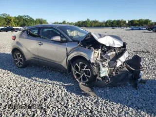 2019 Toyota C-HR XLE z VIN NMTKHMBX6KR070507, wystawiony jako Copart lot #50090175 z przebiegiem 109 471 mil mil oraz Szkody całkowita. Historia ofert i sprzedaży dostępna na DreamBid. Obrazek 4.
