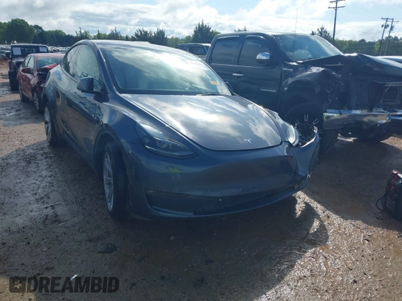 2023 Tesla Model Y Long Range with VIN 7SAYGDEE2PF674286, listed as a IAAI auction lot 42010275 with Not Provided miles and . Bid and sale history available at carsss.com. Image 1.