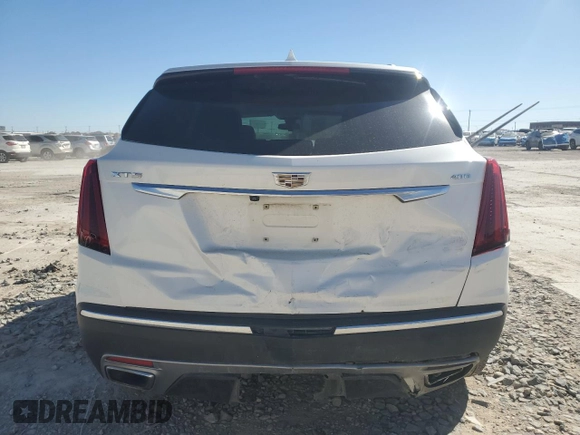 2021 Cadillac XT5 FWD Premium Luxury with VIN 1GYKNCRSXMZ135949, listed as a Copart auction lot 47752805 with 99,838 mi miles and Salvage Title. Bid and sale history available at carsss.com. Image 6.