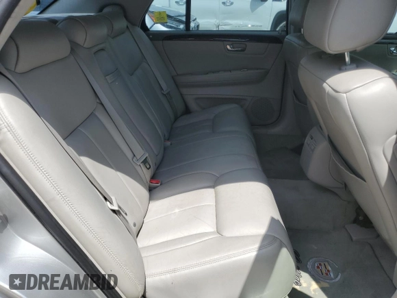 2008 Cadillac DTS 1SD z VIN 1G6KD57Y88U128497, wystawiony jako Copart lot #58138165 z przebiegiem 137 765 mil mil oraz Czysty tytuł • Clean title. Historia ofert i sprzedaży dostępna na DreamBid. Obrazek 10.