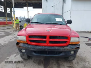 1998 Dodge Dakota SLT with VIN 1B7GG22Y1WS519712, listed as a IAAI auction lot 41913541 with 232,892 mi miles. Bid and sale history available at carsss.com. Image 13.