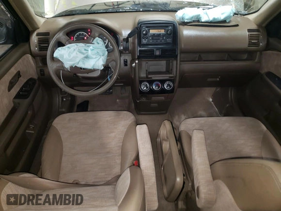 2003 Honda CR-V LX with VIN JHLRD68593C016069, listed as a Copart auction lot 51509435 with 130,489 mi miles and Salvage Title. Bid and sale history available at DreamBid. Image 8.