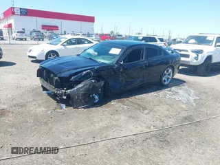 2014 Dodge Charger SE with VIN 2C3CDXBG7EH328575, listed as a IAAI auction lot 41998842 with 73,962 mi miles and . Bid and sale history available at carsss.com. Image 2.