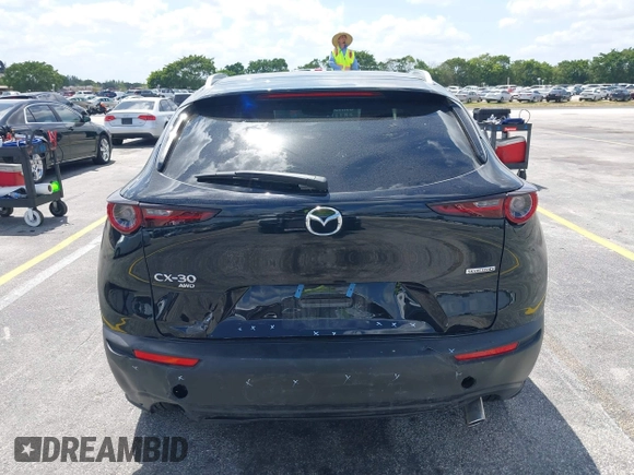 2025 Mazda CX-30 S Preferred with VIN 3MVDMBCM0SM798708, listed as a IAAI auction lot 42133091 with 4,305 mi miles and . Bid and sale history available at DreamBid. Image 16.