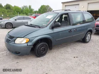 2006 Dodge Grand Caravan SE with VIN 1D4GP24R86B565692, listed as a IAAI auction lot 42038975 with 215,713 mi miles. Bid and sale history available at carsss.com. Image 2.