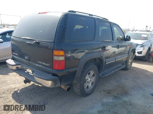 2003 Chevrolet Tahoe LS with VIN 1GNEK13Z03J140250, listed as a IAAI auction lot 41963680 with 281,716 mi miles and . Bid and sale history available at DreamBid. Image 4.