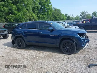 2022 Volkswagen Atlas SE z VIN 1V2HE2CA7NC211835, wystawiony jako IAAI lot #42722660 z przebiegiem 56 112 mil mil oraz . Historia ofert i sprzedaży dostępna na DreamBid. Obrazek 14.