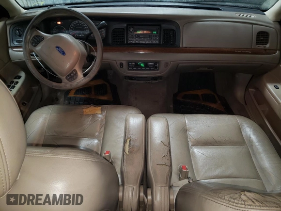 2004 Ford Crown Victoria LX z VIN 2FAFP74W94X171212, wystawiony jako Copart lot #82830214 z przebiegiem 217 595 mil mil oraz Szkody całkowita. Historia ofert i sprzedaży dostępna na DreamBid. Obrazek 8.