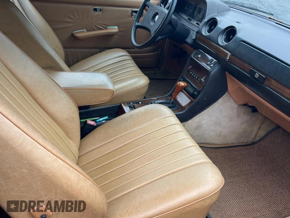 1984 Mercedes-Benz 300 with VIN WDBAB53A5EA022012, listed as a Copart auction lot 56141945 with 114,089 mi miles and Clean Title. Bid and sale history available at DreamBid. Image 5.