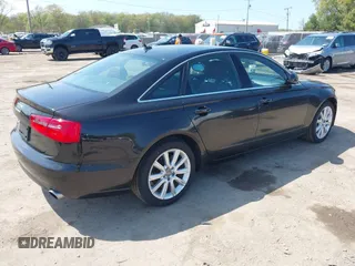 2013 Audi A6 Premium Plus с VIN WAUDFAFC2DN081032, выставлен на аукционе IAAI как лот 42212563 с пробегом 131 601 миль миль и . История ставок и продаж доступна на DreamBid. Изображение 4.