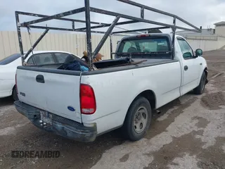 1997 Ford F-150 with VIN 1FTDF17W1VLB81647, listed as a IAAI auction lot 42677744 with 190,259 mi miles and . Bid and sale history available at DreamBid. Image 4.