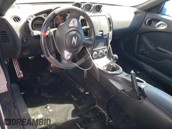 2014 Nissan 370Z with VIN JN1AZ4EH2EM631397, listed as a Copart auction lot 65758844 with 0 mi miles and Salvage Title. Bid and sale history available at carsss.com. Image 8.