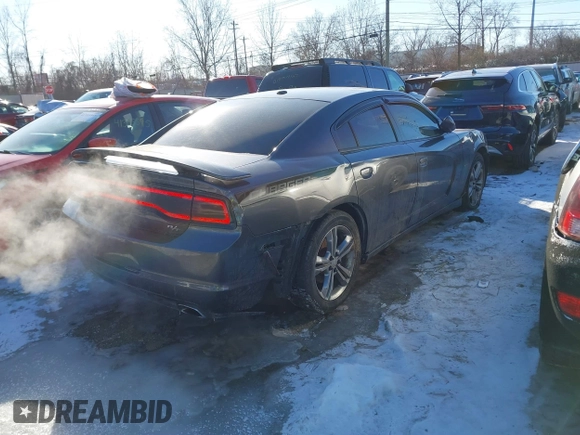 2013 Dodge Charger RT Plus with VIN 2C3CDXDT7DH558898, listed as a IAAI auction lot 41364210 with 144,351 mi miles. Bid and sale history available at carsss.com. Image 4.