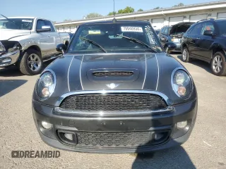 2014 MINI Convertible S с VIN WMWZP3C52ET706661, выставлен на аукционе Copart как лот 70040934 с пробегом 65 484 миль миль и Списание • Salvage title. История ставок и продаж доступна на DreamBid. Изображение 5.