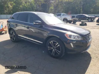 2015 Volvo XC60 T5 Drive-E Premier Plus with VIN YV440MDC4F2580604, listed as a Copart auction lot 73944294 with 167,173 mi miles and Salvage Title. Bid and sale history available at carsss.com. Image 4.