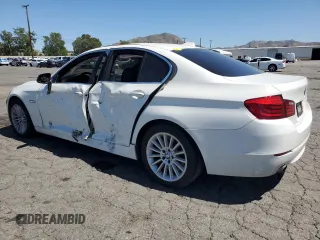 2013 BMW 5 Series 535i with VIN WBAFR7C56DC823291, listed as a Copart auction lot 56621415 with 100,423 mi miles and Salvage title. Bid and sale history available at DreamBid. Image 2.