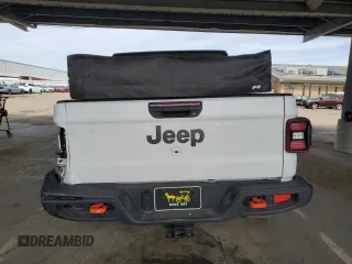 2024 Jeep Gladiator Mojave X с VIN 1C6JJTEGXRL105429, выставлен на аукционе Copart как лот 49850525 с пробегом 4 692 миль миль и Списание • Salvage title. История ставок и продаж доступна на DreamBid. Изображение 6.