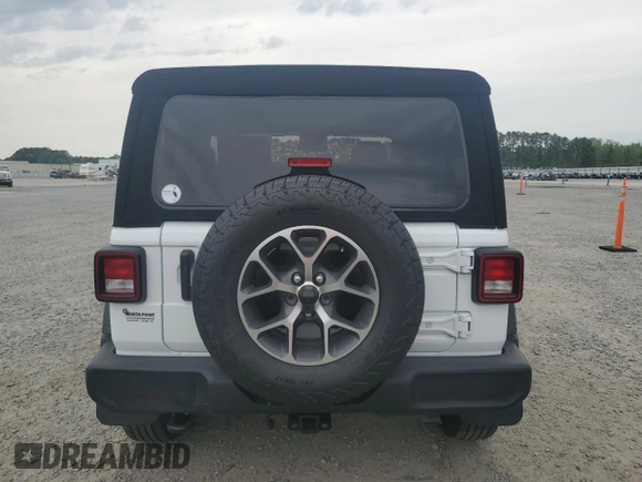 2024 Jeep Wrangler Sport S with VIN 1C4PJXAG3RW368392, listed as a Copart auction lot 52962535 with 9,128 mi miles and Salvage title. Bid and sale history available at DreamBid. Image 6.