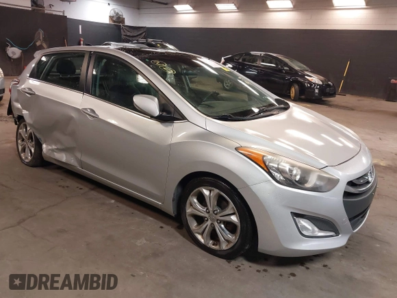 2013 Hyundai Elantra GT with VIN KMHD35LE2DU105677, listed as a IAAI auction lot 42027623 with 137,063 mi miles. Bid and sale history available at carsss.com. Image 1.