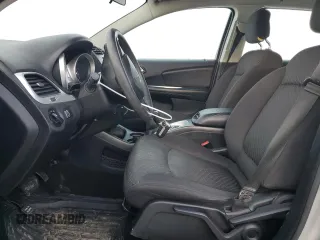 2013 Dodge Journey American Value with VIN 3C4PDCAB9DT604157, listed as a Copart auction lot 48206675 with 158,392 mi miles and Salvage Title. Bid and sale history available at DreamBid. Image 7.