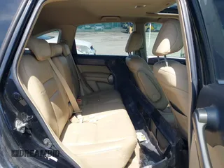 2009 Honda CR-V EX-L with VIN 5J6RE48799L068756, listed as a IAAI auction lot 42142229 with 198,920 mi miles and . Bid and sale history available at carsss.com. Image 8.