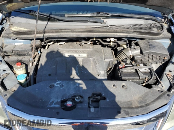 2010 Honda Odyssey EX-L z VIN 5FNRL3H75AB067634, wystawiony jako Copart lot #51538755 z przebiegiem 150 261 mil mil oraz Szkoda całkowita • Salvage title. Historia ofert i sprzedaży dostępna na DreamBid. Obrazek 13.