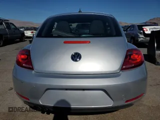 2014 Volkswagen Beetle Entry с VIN 3VWF17AT6EM642555, выставлен на аукционе Copart как лот 46953805 с пробегом 95 153 миль миль и Списание • Salvage title. История ставок и продаж доступна на DreamBid. Изображение 6.