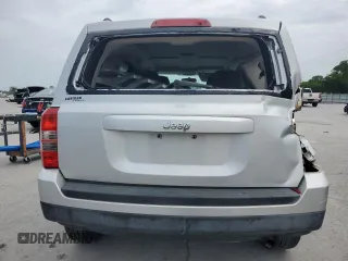 2011 Jeep Patriot Sport with VIN 1J4NT1GBXBD146292, listed as a Copart auction lot 56982555 with 241,524 mi miles and Salvage title. Bid and sale history available at DreamBid. Image 6.