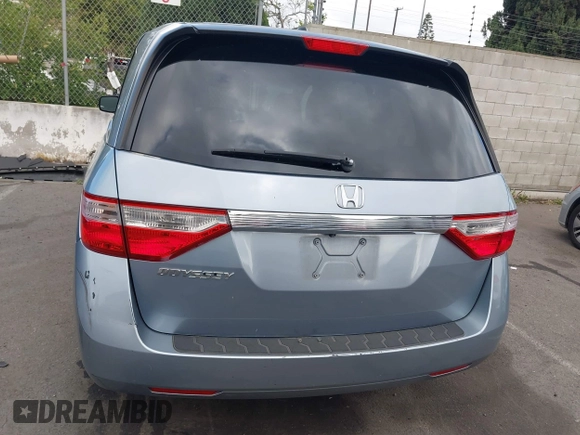 2012 Honda Odyssey EX-L with VIN 5FNRL5H60CB095086, listed as a IAAI auction lot 42251330 with 144,232 mi miles and . Bid and sale history available at DreamBid. Image 16.
