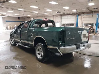 2002 Dodge 1500 with VIN 3B7HA18N02G113497, listed as a IAAI auction lot 39911524 with 127,262 mi miles and . Bid and sale history available at DreamBid. Image 3.