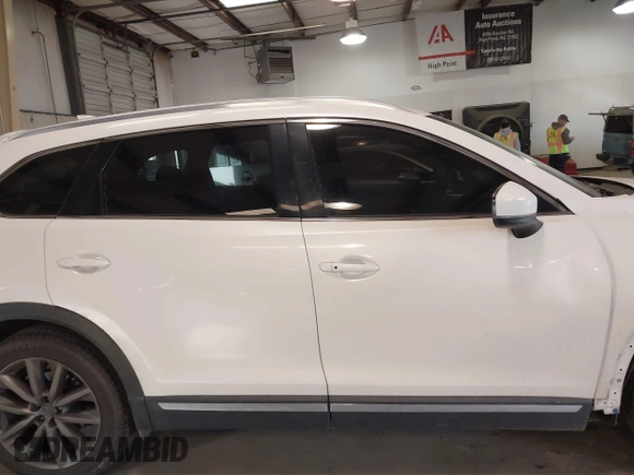 2017 Mazda CX-9 Grand Touring with VIN JM3TCADY5H0132572, listed as a IAAI auction lot 41421008 with 66,656 mi miles and . Bid and sale history available at DreamBid. Image 13.