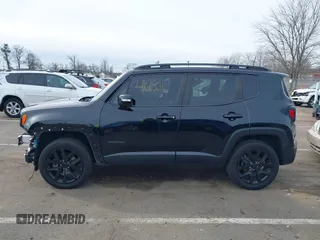 2018 Jeep Renegade Latitude with VIN ZACCJBBB1JPJ07734, listed as a IAAI auction lot 41615042 with 60,675 mi miles and . Bid and sale history available at carsss.com. Image 14.