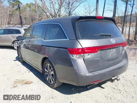 2014 Honda Odyssey Touring with VIN 5FNRL5H92EB016546, listed as a IAAI auction lot 41689148 with 143,601 mi miles and . Bid and sale history available at DreamBid. Image 14.