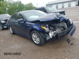 2019 Kia Optima LX with VIN 5XXGT4L39KG275693, listed as a IAAI auction lot 42310335 with 128,008 mi miles and . Bid and sale history available at DreamBid. Image 1.