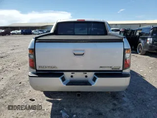 2006 Honda Ridgeline RTL z VIN 2HJYK16506H536386, wystawiony jako Copart lot #56457495 z przebiegiem 305 168 mil mil oraz Szkoda całkowita • Salvage title. Historia ofert i sprzedaży dostępna na DreamBid. Obrazek 6.