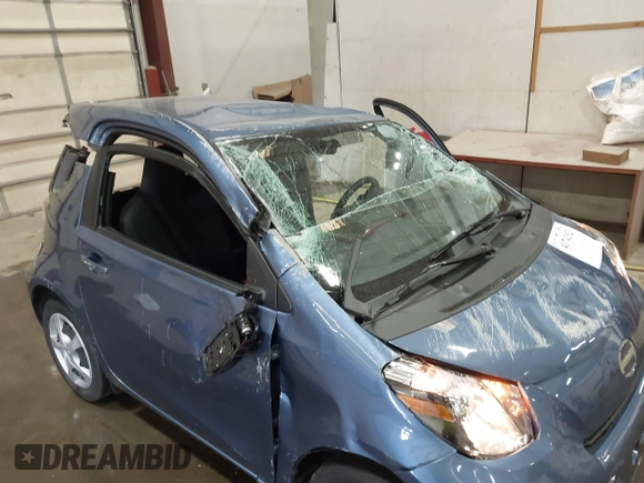 2012 Scion iQ with VIN JTNJJXB01CJ010943, listed as a IAAI auction lot 41742923 with 1 mi miles. Bid and sale history available at carsss.com. Image 14.