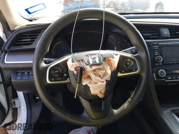 2020 Honda Civic LX z VIN 2HGFC2F68LH565560, wystawiony jako IAAI lot #41517853 z przebiegiem 96 832 mil mil oraz . Historia ofert i sprzedaży dostępna na DreamBid. Obrazek 11.