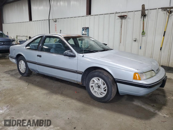 1990 Ford Thunderbird with VIN 1FAPP6047LH140817, listed as a Copart auction lot 83910194 with 177,909 mi miles and Salvage Title. Bid and sale history available at DreamBid. Image 4.