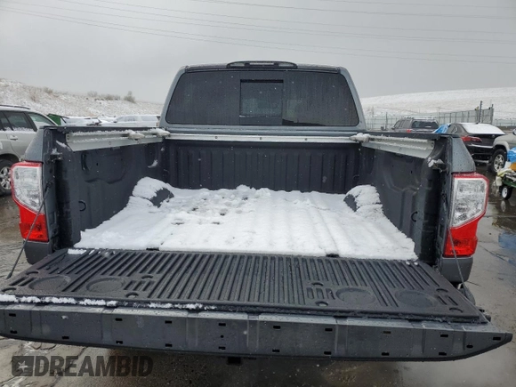 2018 Nissan Titan Pro-4X z VIN 1N6AA1E51JN536680, wystawiony jako Copart lot #82361724 z przebiegiem 98 699 mil mil oraz Szkoda całkowita • Salvage title. Historia ofert i sprzedaży dostępna na DreamBid. Obrazek 6.