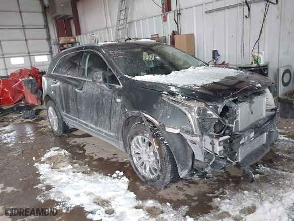 2018 Cadillac XT5 Luxury FWD with VIN 1GYKNCRS3JZ132726, listed as a IAAI auction lot 41572809 with NaN miles. Bid and sale history available at carsss.com. Image 1.
