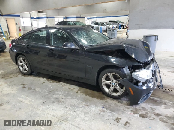2015 BMW 4 Series 428i xDrive with VIN WBA4A7C52FD415821, listed as a Copart auction lot 51622295 with 63,918 mi miles and Salvage title. Bid and sale history available at DreamBid. Image 4.