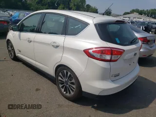 2017 Ford C-Max Energi Titanium with VIN 1FADP5FU3HL105023, listed as a Copart auction lot 65458784 with 64,443 mi miles and Salvage Title. Bid and sale history available at carsss.com. Image 2.