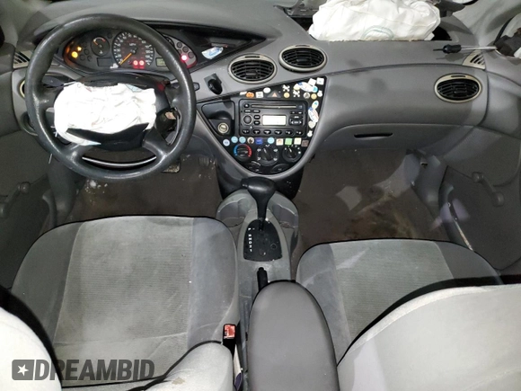 2002 Ford Focus LX with VIN 1FAFP33P52W126344, listed as a Copart auction lot 49757324 with 140,612 mi miles and Salvage Title. Bid and sale history available at DreamBid. Image 8.